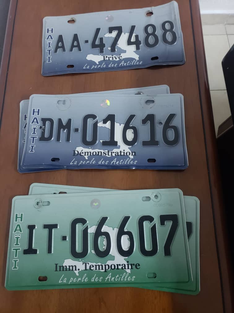 The license plates discovered inside the vehicles when the arrest occurred.    